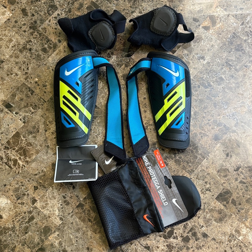 Nike Black and Blue Shin Guards with Neon Accents